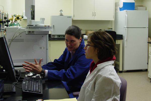 Professor Lawrence and Laura Bochner '10 reviewing data